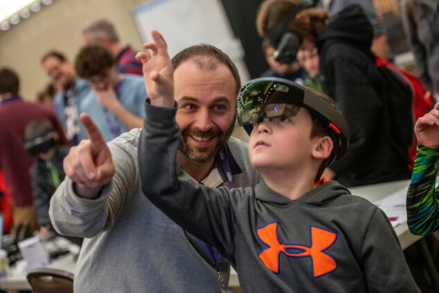 image of science fair attendees